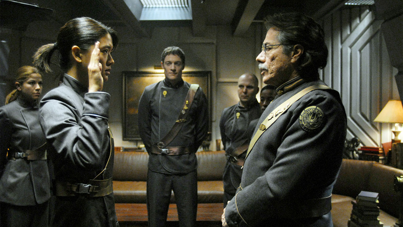 Luciana Carro, Grace Park, Tahmoh Penikett, Edward James Olmos, in BATTLESTAR GALACTICA.